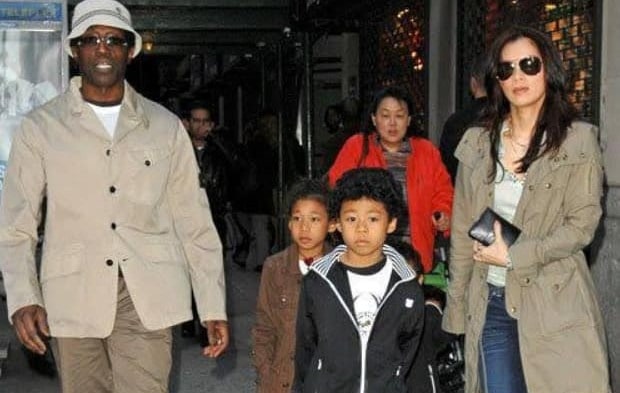 Nakyung Park wearing grey color long coat and white jeans.